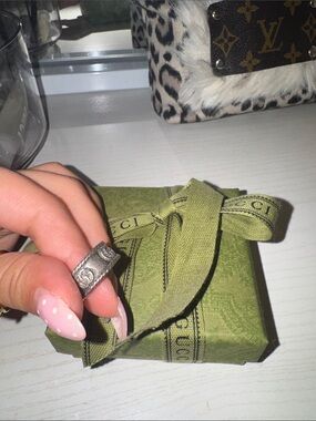 Authentic Gucci Silver-Tone Embossed Logo Ring with original Gucci box